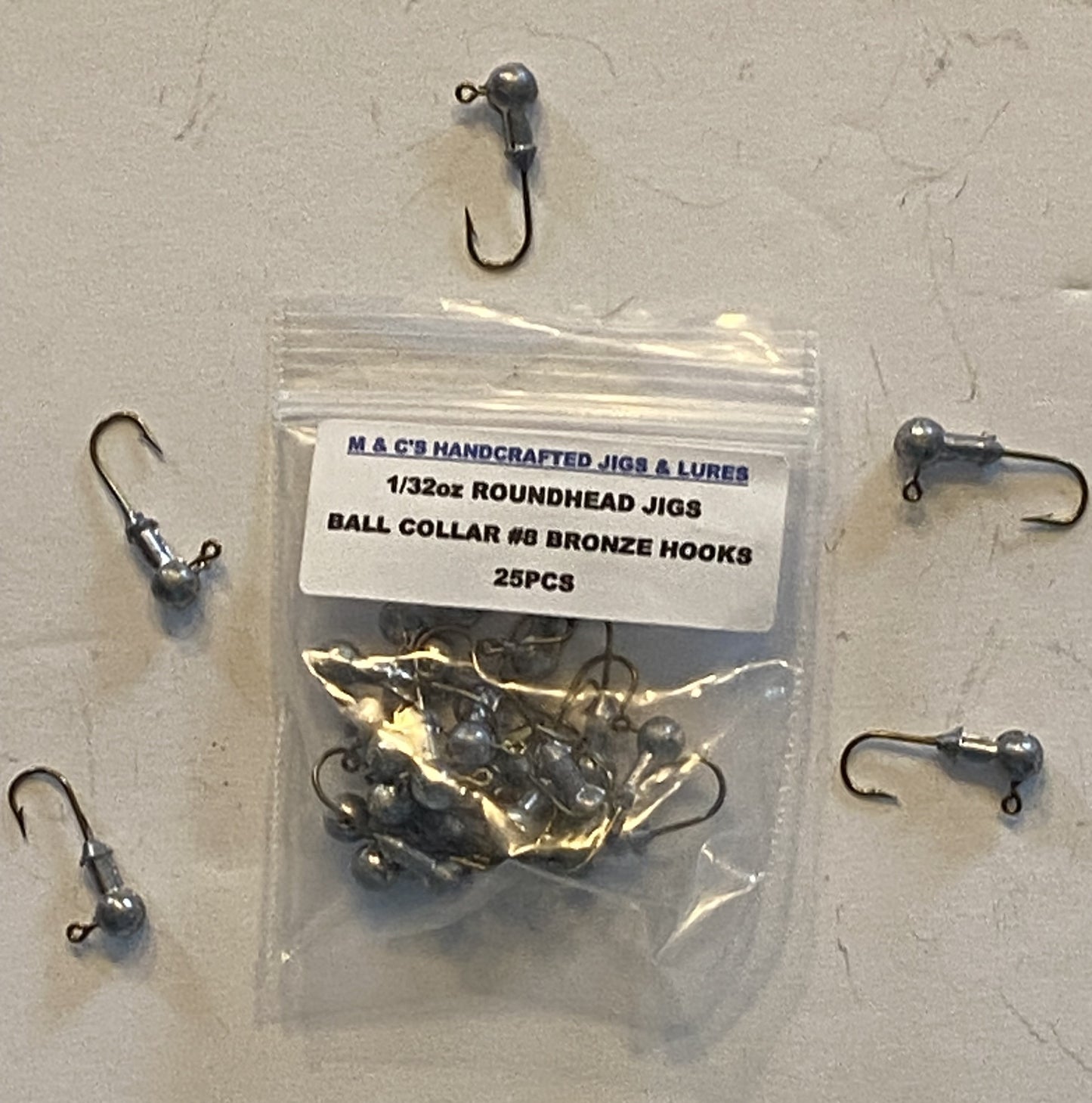 1/32oz, Round head jigs with lead collar #8 bronze hooks