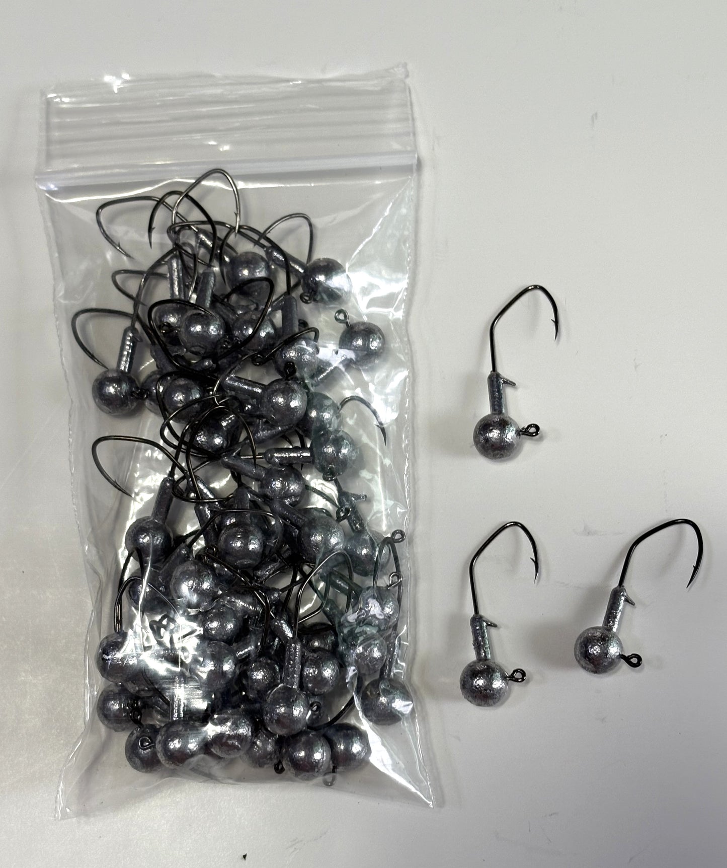 50 Handmade 1/4oz Round head with barb collar jig with a Matzou 1/0 BN sickle