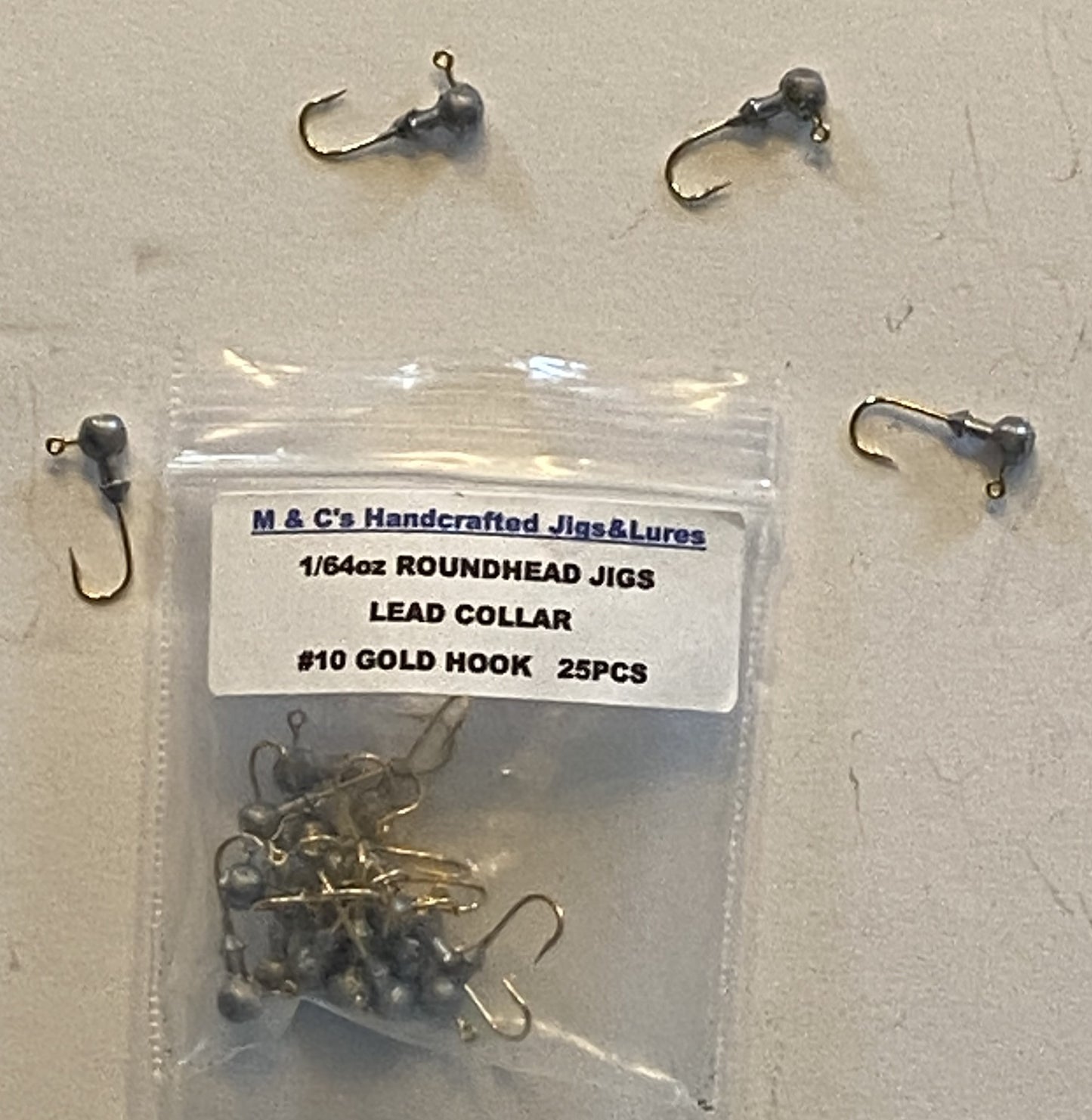 1/64oz, Round head jigs with lead collar #10 gold hooks
