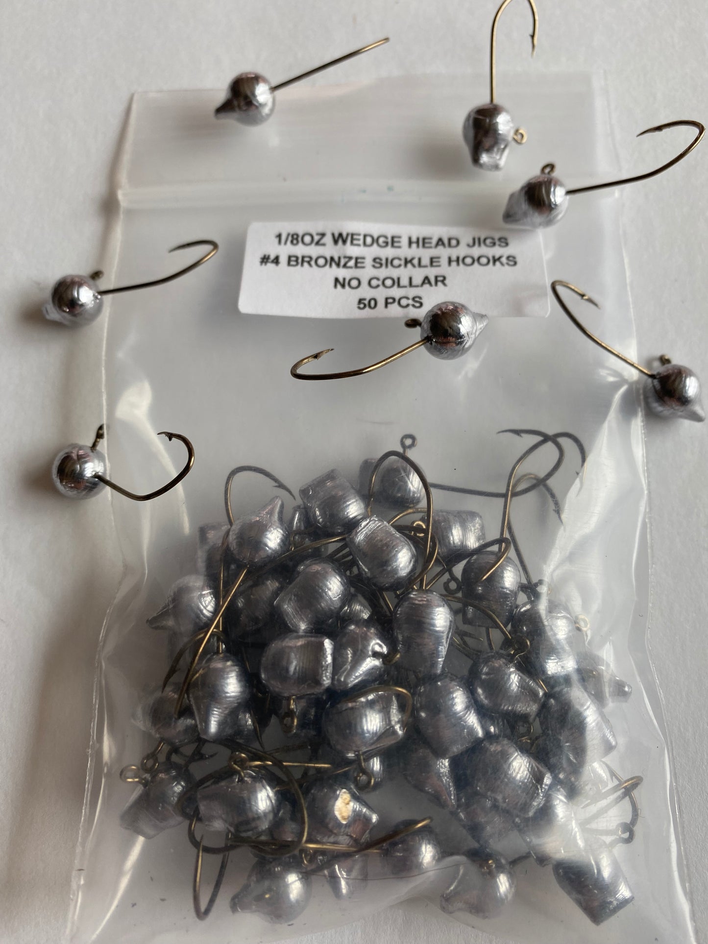 Wedge Head Jig with no collar different sizes and hooks 50pcs