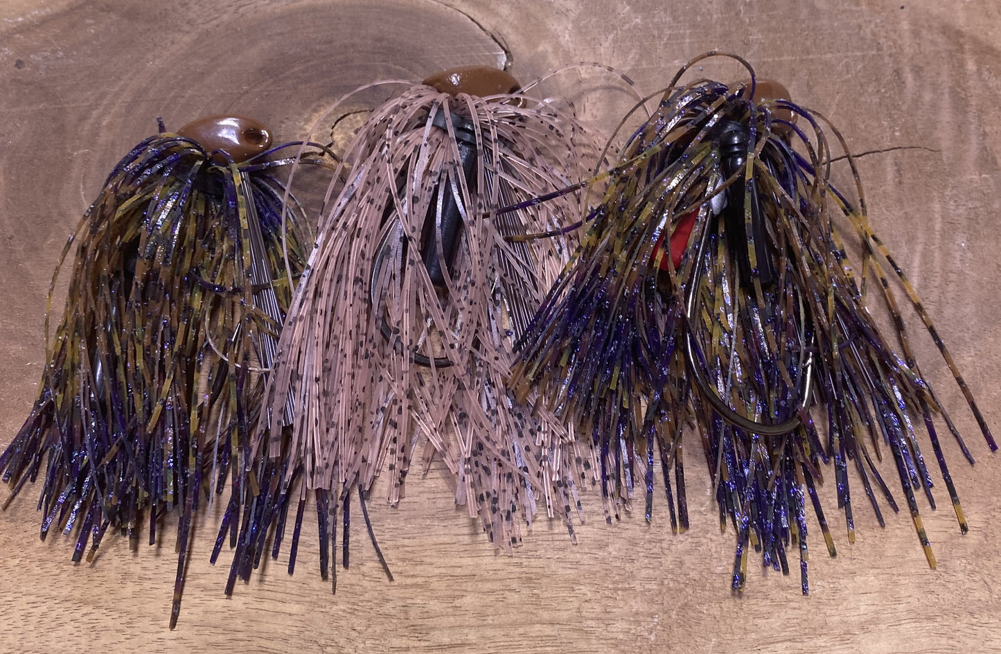 (2) Bass 1/2oz Brush Jigs with 4/0 32786BLN Mustad Ultra Point hooks. And (1) 3/8oz Bass Brush Jigs with 3/0 32786BLN Mustad Ultra Point hooks.