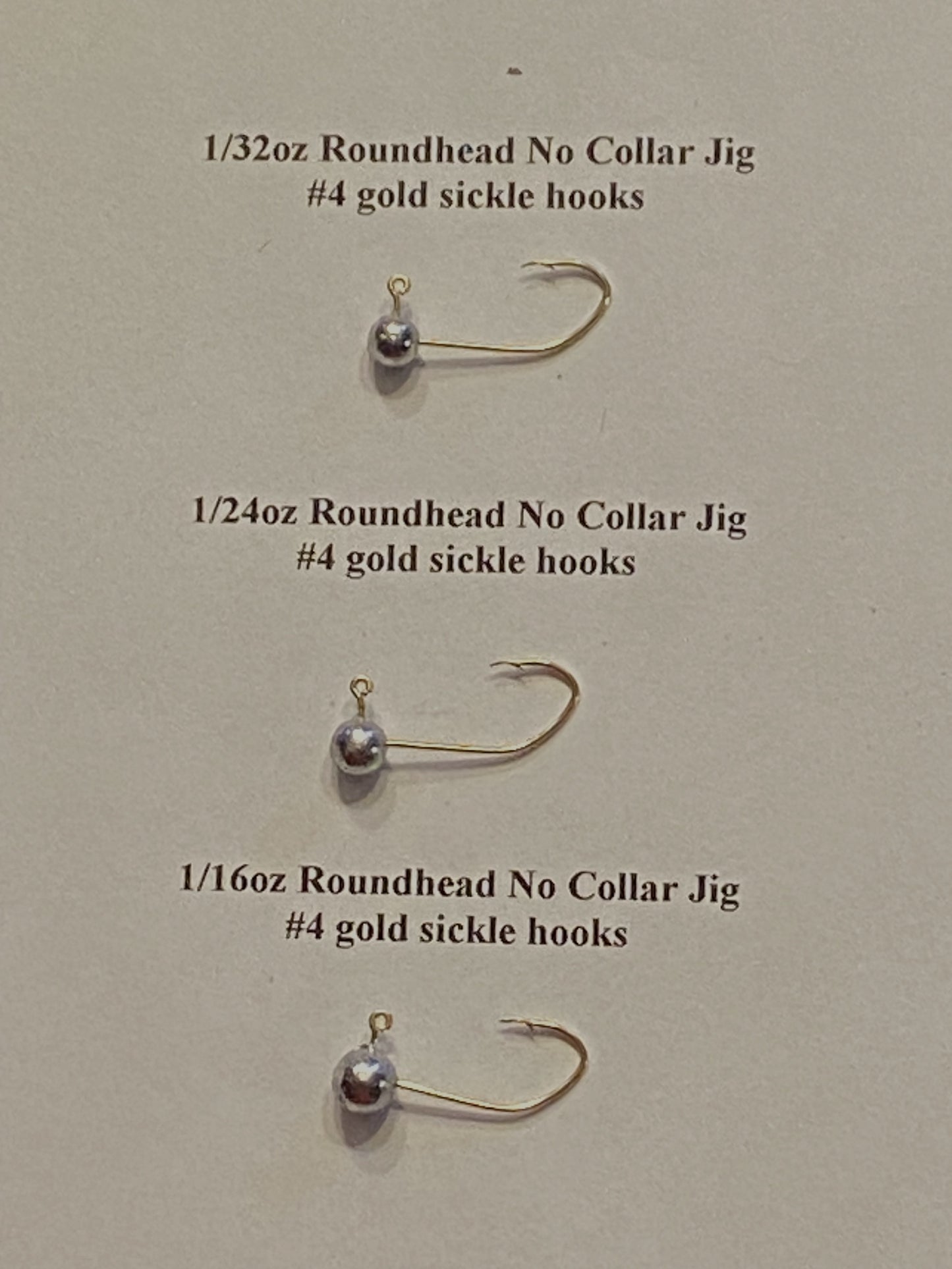 1/32oz 1/24oz, or 1/16oz Round head no collar jigs with a #4 Gold sickle hook Good for panfish 50 pcs
