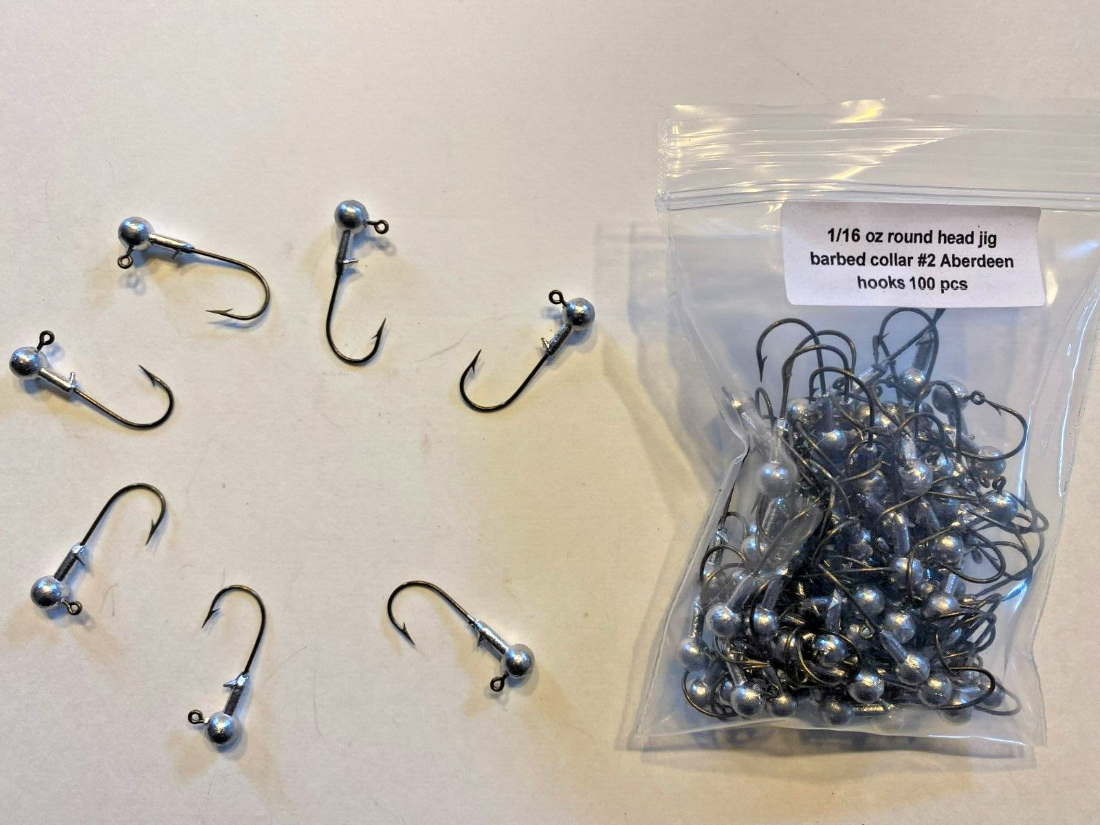 1/16oz Roundhead Barb Collar with #2 bronze J hooks 100pcs – M & C's  Handcrafted Jigs & Lures