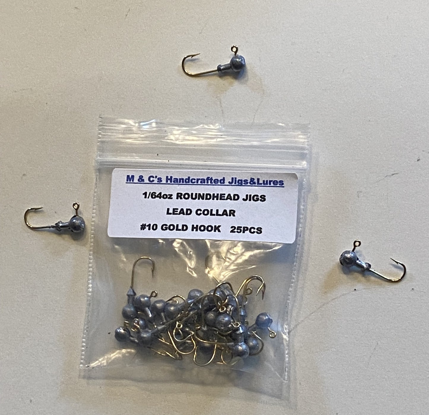 1/64oz Roundhead jig with lead collar (no barb) jigs with #10 Gold aberdeen hooks 25 pcs