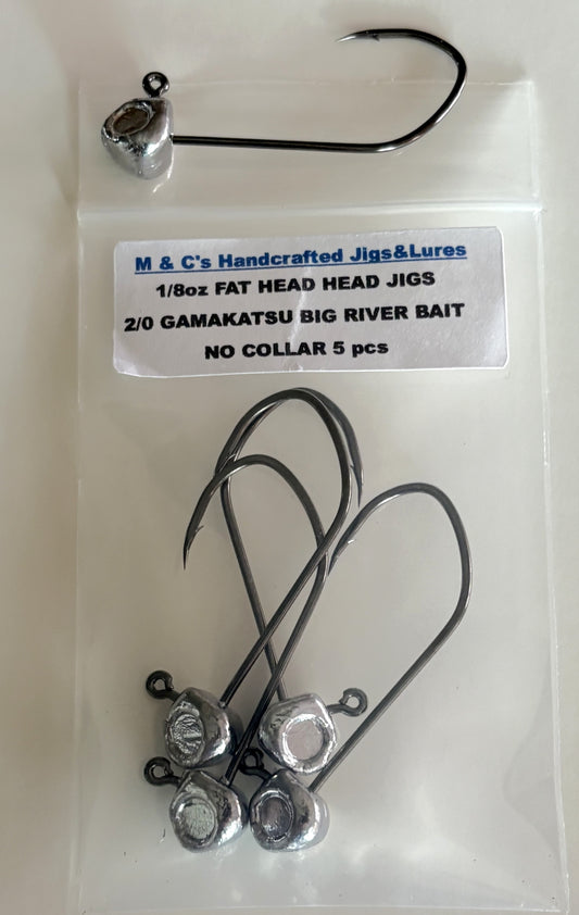 5 Hand made 1/8oz Fat Head jigs heads with a 1/0 or 2/0 Gamakatsu Big River hook.