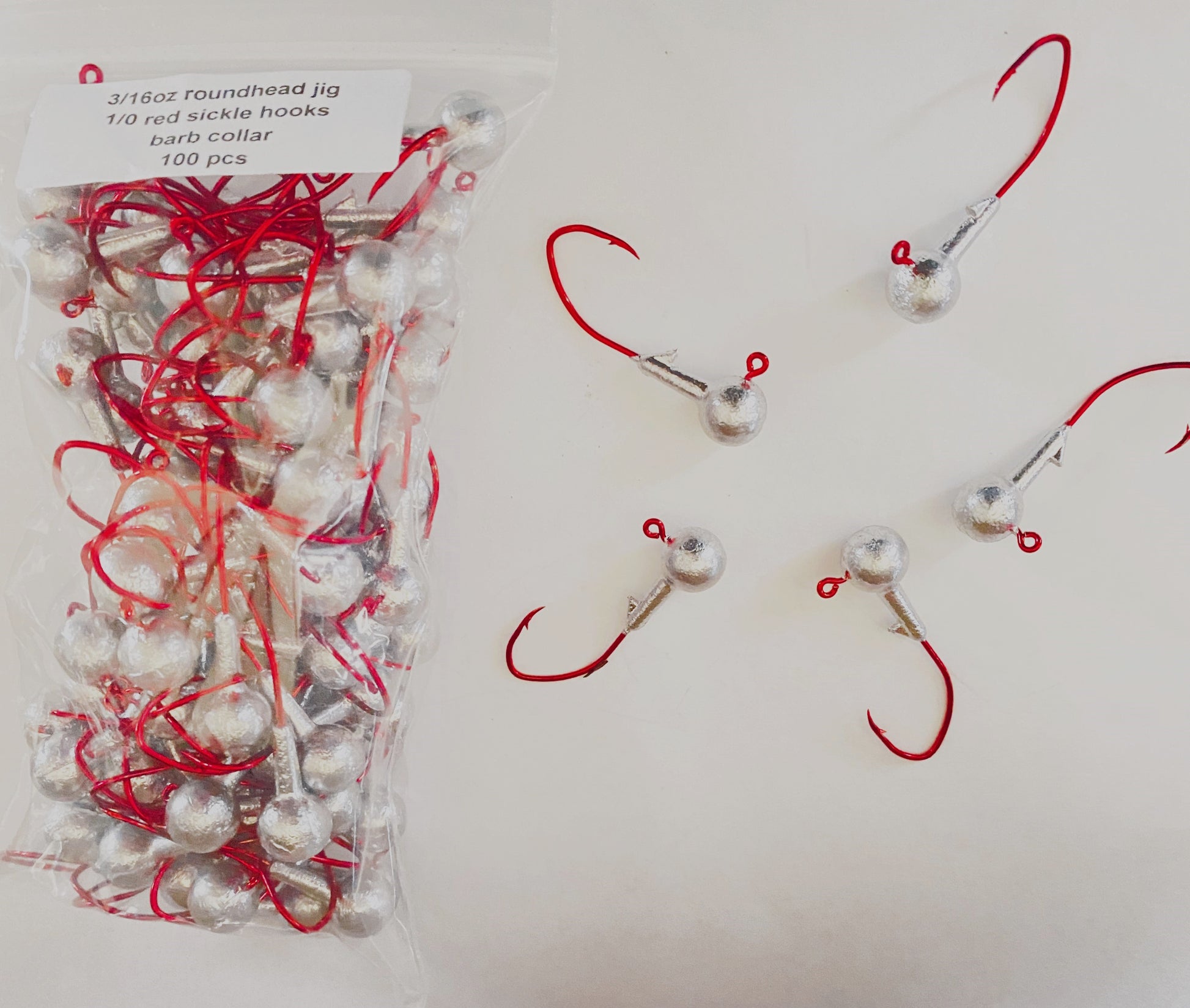 3/16 oz round head barbed collar jigs with 1/0 red sickle hook 100