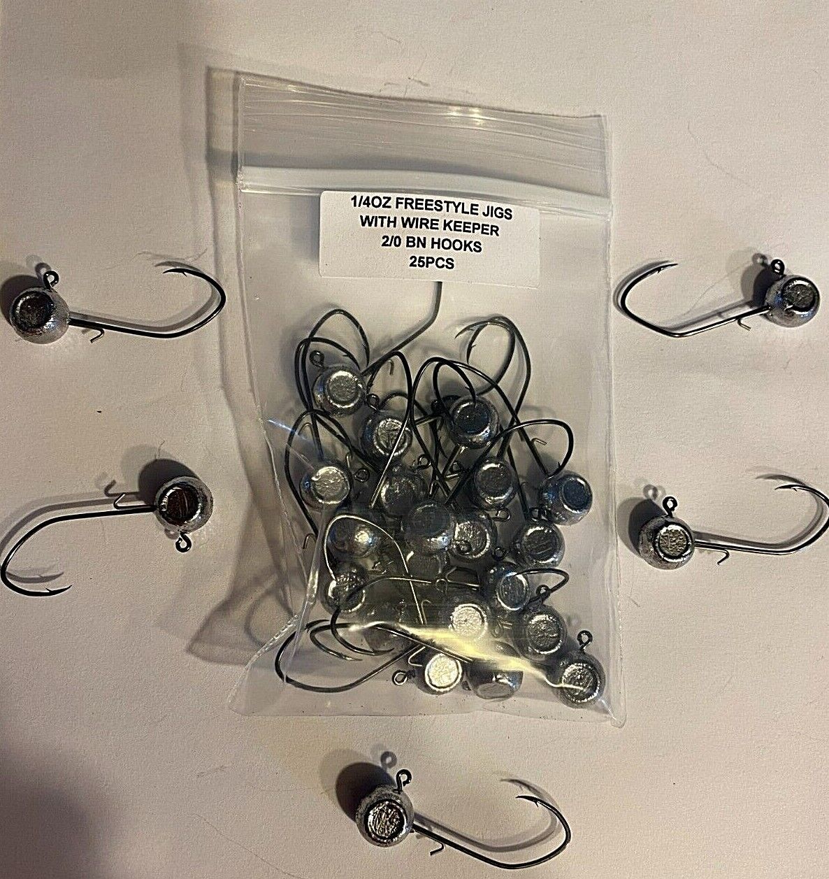 1/4oz w/keeper walleye freestyle jig heads with a 2/0 BN sickle 25 pcs